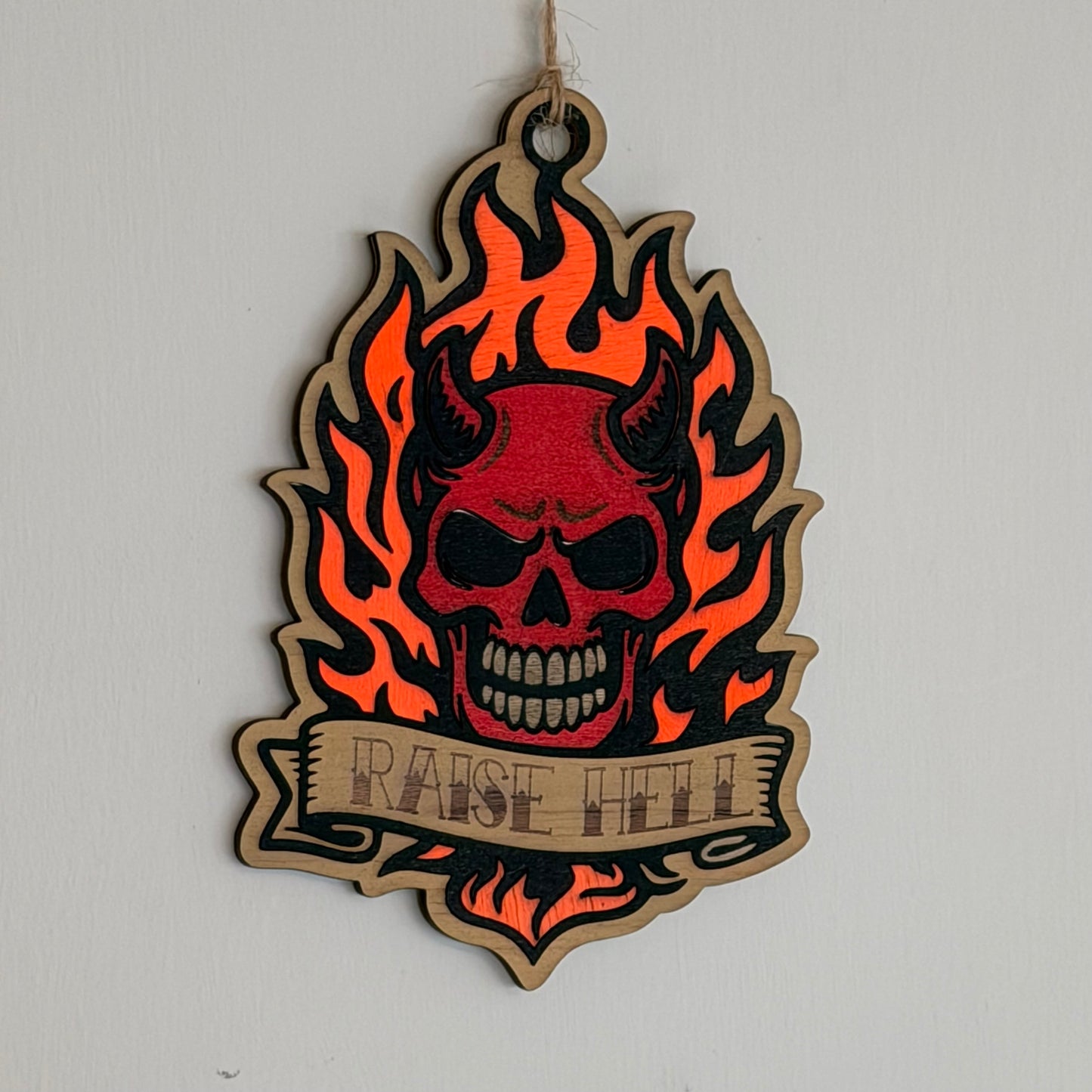 Raise Hell flaming skull tattoo-style hanging charm — photo 1
