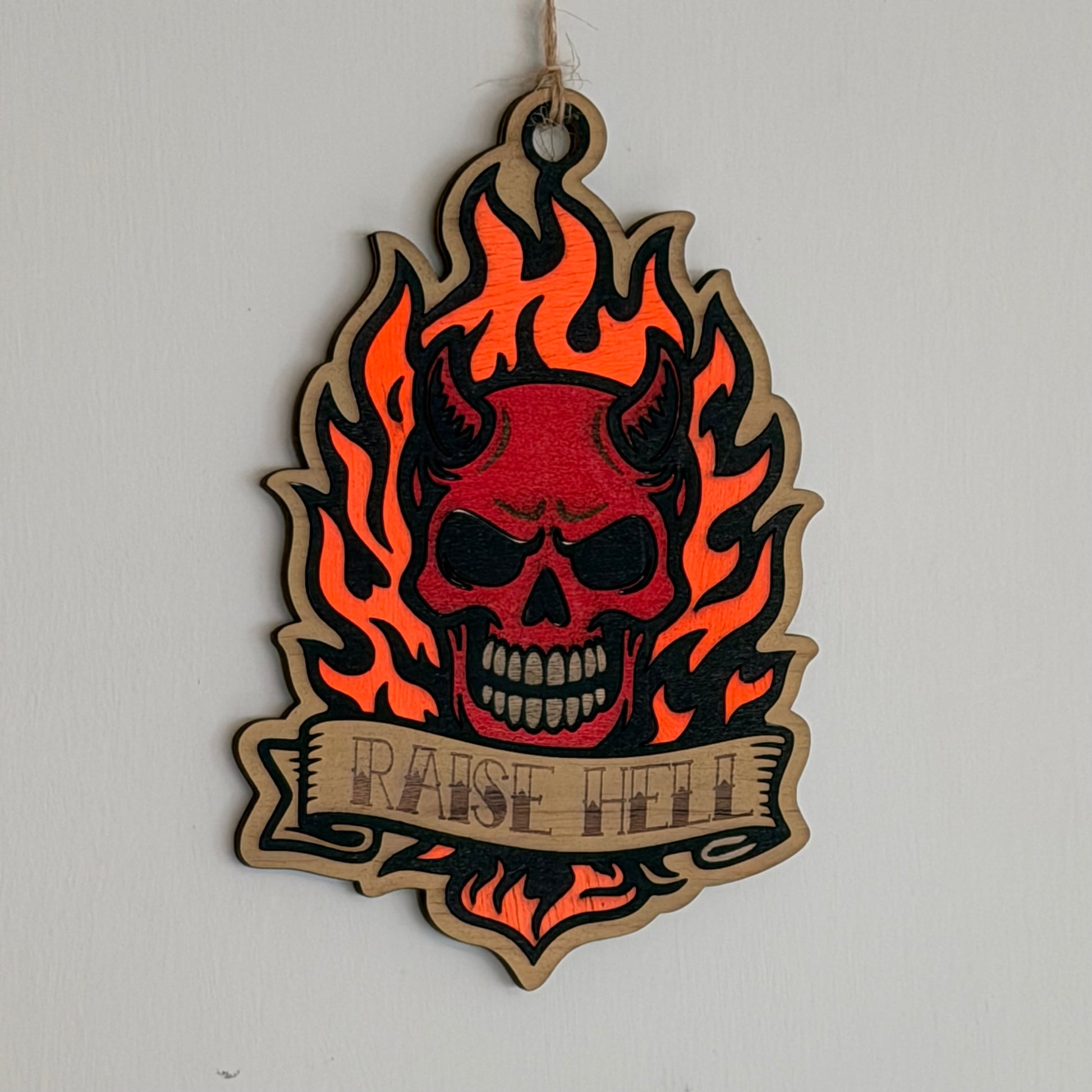 Raise Hell flaming skull tattoo-style hanging charm — photo 1