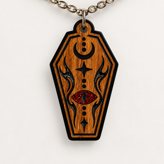 Walnut coffin pendant necklace with red glitter eye and celestial black engravings