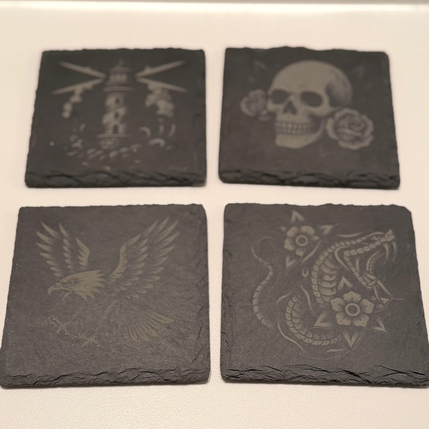 The Tattooed Talisman Set – Engraved Slate Coaster Quartet (with Holder)