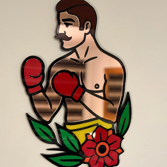 Full view of The Boxer acrylic wall hanging depicting an old‑school fighter with red boxing gloves, moustache and flower embellishment on a beige background.