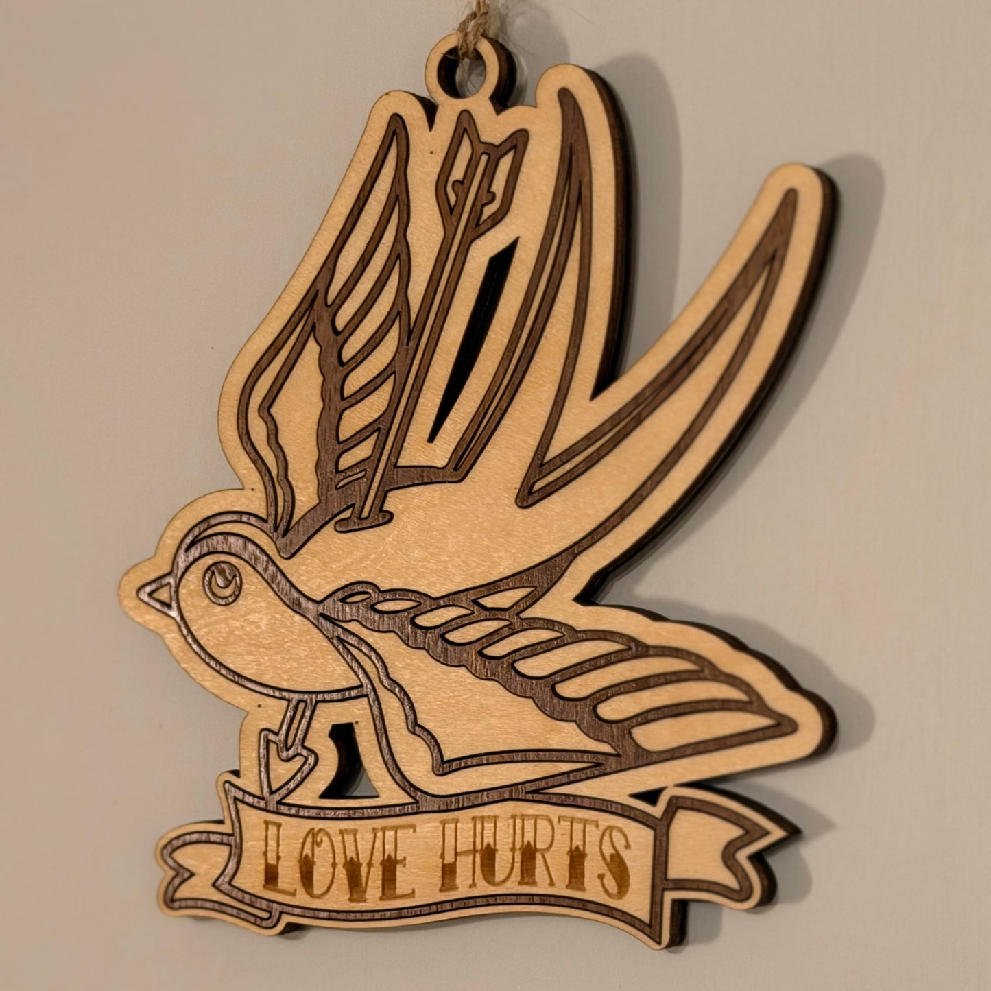 The Swallow of Sorrow – Laser-Cut Hanging Charm — product photo 2