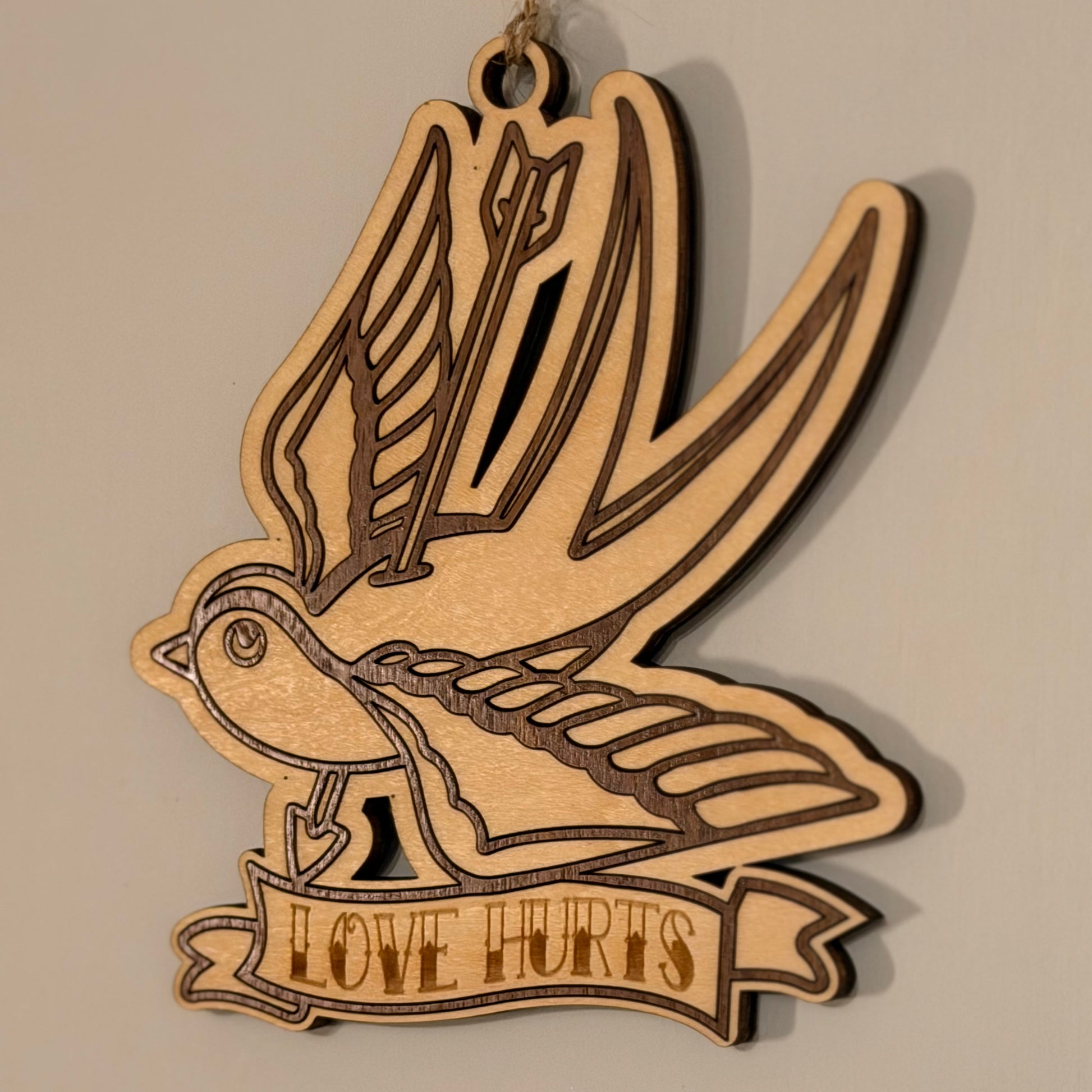 The Swallow of Sorrow – Laser-Cut Hanging Charm — product photo 2
