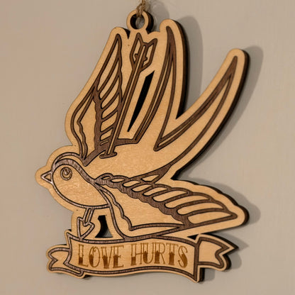 Swallow of Sorrow tattoo-style hanging charm with arrow motif — photo 2