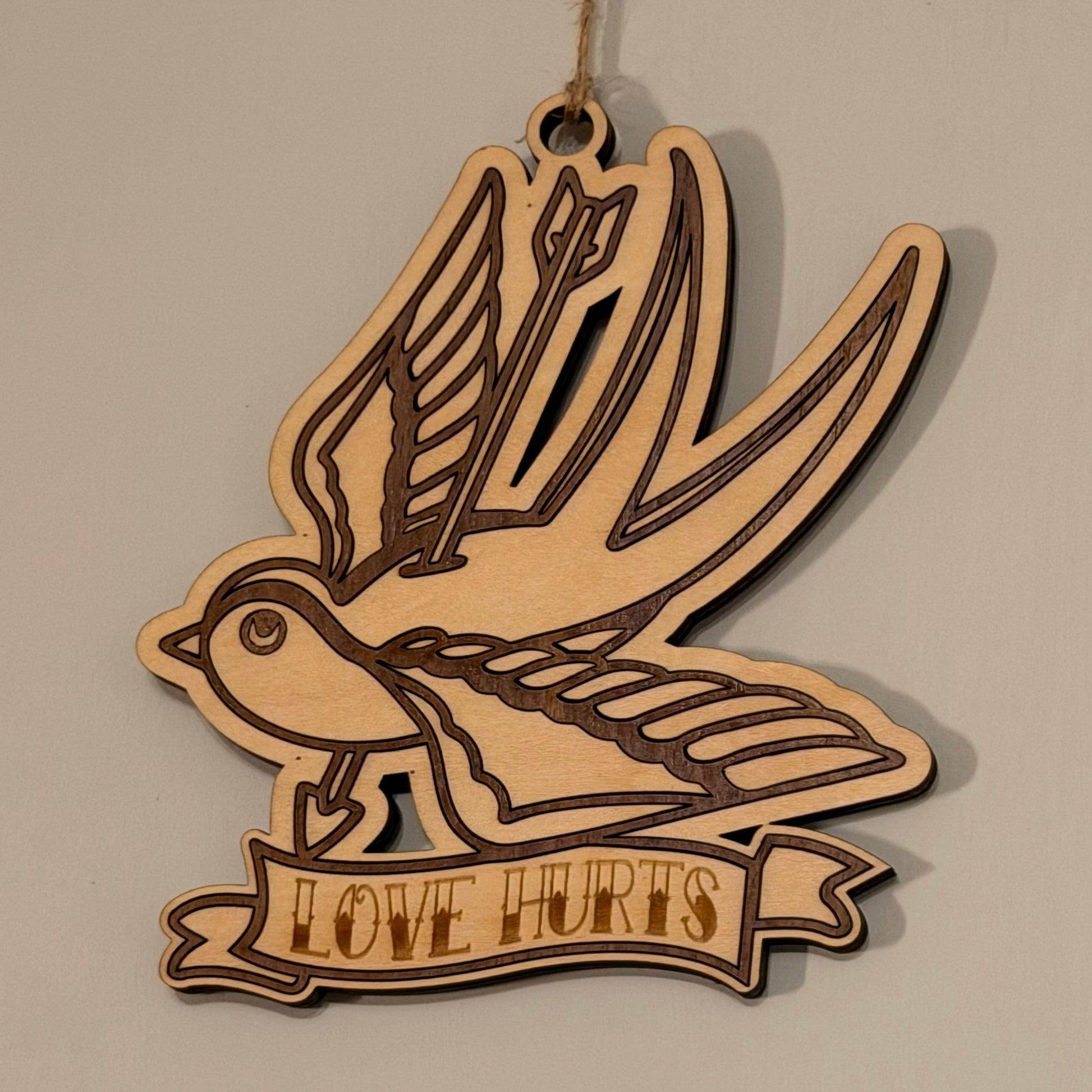 The Swallow of Sorrow – Laser-Cut Hanging Charm — product photo 3