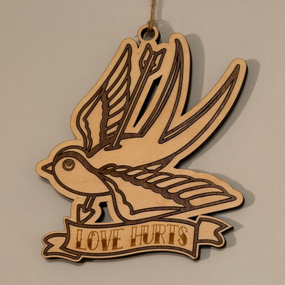 Swallow of Sorrow tattoo-style hanging charm with arrow motif — photo 3