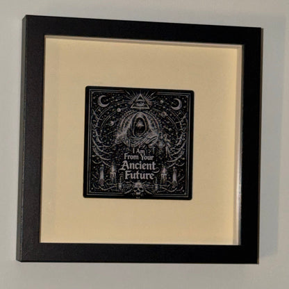 Ancient Future — Framed Esoteric Art in black shadow-box frame, 18 cm square, with warm ivory backing and 95 mm engraved acrylic artwork