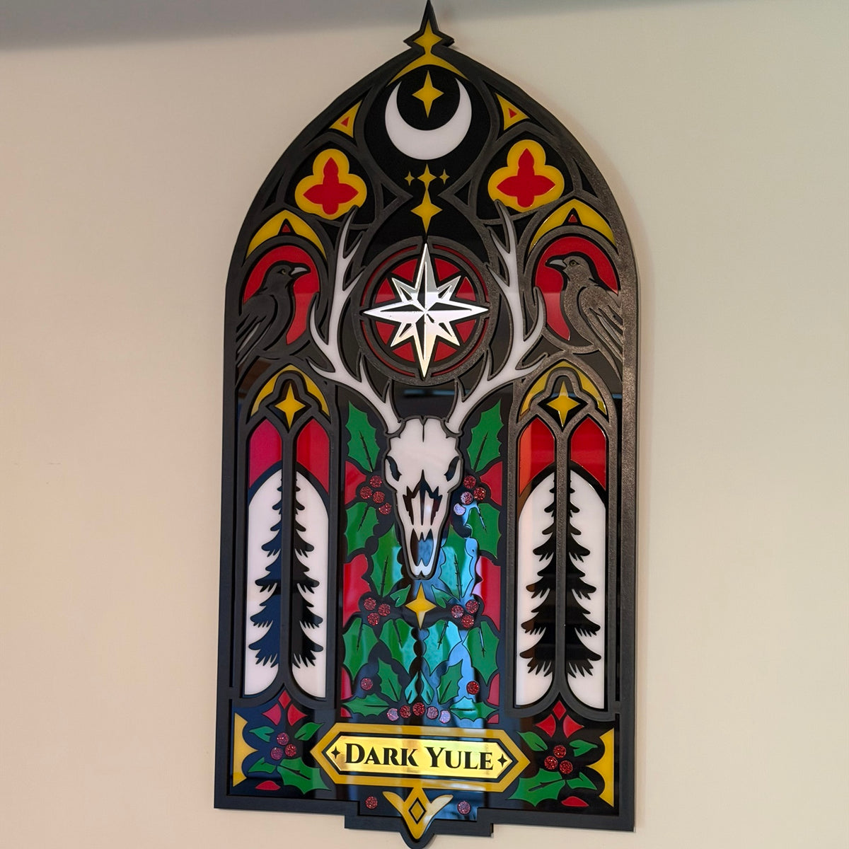 Angled view of Dark Yule gothic wall hanging showing layered construction and glossy acrylic details