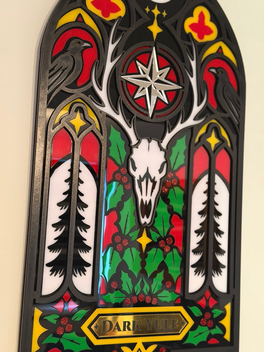 Close-up detail of Dark Yule gothic wall hanging showing ravens, antlers, skull and holly