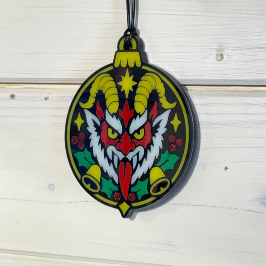 Angled view of Merry Hexmas Krampus ornament showing layered construction